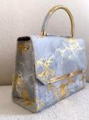 Sac bleu ciel imprimé doré